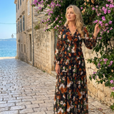 Tovawyn | Floral Print Long Sleeve Tiered Maxi Dress