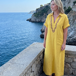 Kalthea | Short Sleeve V Neck  Embroidered Detail Midi Dress