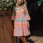 Larsia | Geometric Print V Neck Tiered Knee Length Dress